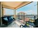 Relaxing balcony seating with waterfront view, featuring stylish outdoor furniture at 6372 Palma Del Mar S Blvd # 1007, St Petersburg, FL 33715