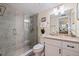 Updated bathroom featuring a large glass enclosed shower and granite topped vanity at 6372 Palma Del Mar S Blvd # 1007, St Petersburg, FL 33715