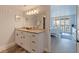 Bright bathroom featuring a double vanity, granite countertop and a shower at 6372 Palma Del Mar S Blvd # 1007, St Petersburg, FL 33715