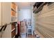 Walk-in closet features wire and solid shelving, and a hanging rod at 6372 Palma Del Mar S Blvd # 1007, St Petersburg, FL 33715