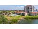Beautiful exterior view of the condos overlooking the water and a pool, near a golf course and beaches at 6372 Palma Del Mar S Blvd # 1007, St Petersburg, FL 33715