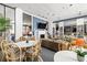 Community lounge and library featuring comfortable seating, fireplace, and built-in bookshelves at 6372 Palma Del Mar S Blvd # 1007, St Petersburg, FL 33715
