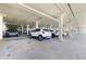 Well-lit covered parking garage with assigned spots at 6372 Palma Del Mar S Blvd # 1007, St Petersburg, FL 33715