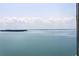 Breathtaking water view featuring a bridge extending to an island beneath a cloudy sky at 6372 Palma Del Mar S Blvd # 1007, St Petersburg, FL 33715