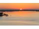 Striking water view with the sun setting over the horizon, casting a warm glow at 6372 Palma Del Mar S Blvd # 1007, St Petersburg, FL 33715