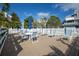 Outdoor deck area furnished with comfortable lounge chairs and tables, offering a relaxing space for residents at 6826 Stones Throw N Cir # 11104, St Petersburg, FL 33710