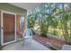 Private patio with views of tropical landscaping at 6826 Stones Throw N Cir # 11104, St Petersburg, FL 33710
