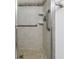 Shower with updated tile surround, corner shelves and grab bars at 6826 Stones Throw N Cir # 11104, St Petersburg, FL 33710