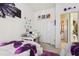 Bright bedroom with twin beds, sewing station, and connected bath at 767 Tremont Greens Ln # 64, Sun City Center, FL 33573