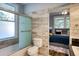 Bathroom featuring a shower/tub combination and an ensuite view of the bedroom through a doorway at 800 Druid S Rd, Clearwater, FL 33756