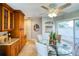 Dining area featuring a glass table and outdoor access, perfect for entertaining at 800 Druid S Rd, Clearwater, FL 33756