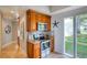 Bright kitchen featuring stainless steel appliances and granite countertops at 800 Druid S Rd, Clearwater, FL 33756