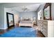 Sunlit main bedroom boasting neutral walls, wood floors, and refined furnishings at 800 Druid S Rd, Clearwater, FL 33756