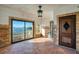 Charming patio with terra-cotta tile, brick accents, and a scenic waterfront view at 800 Druid S Rd, Clearwater, FL 33756