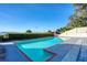Beautiful pool offering a refreshing escape with picturesque bay views and manicured landscaping at 800 Druid S Rd, Clearwater, FL 33756