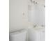 Bathroom with white fixtures and shower at 8725 N Boulevard, Tampa, FL 33604