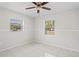Bedroom with two windows providing natural light at 8725 N Boulevard, Tampa, FL 33604