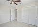 Bedroom with ceiling fan and closet at 8725 N Boulevard, Tampa, FL 33604