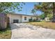 Concrete driveway leading to the front of the home at 8725 N Boulevard, Tampa, FL 33604