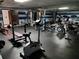 Fully equipped gym with weights, exercise machines and mirrored walls at 10034 64Th N Ave # 11, St Petersburg, FL 33708