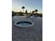 Exterior with in-ground pool, hot tub, patio, and tropical landscaping; ideal for outdoor relaxation at 10034 64Th N Ave # 11, St Petersburg, FL 33708