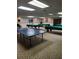 Spacious recreation room equipped with billiard and ping pong tables and comfortable seating at 10034 64Th N Ave # 11, St Petersburg, FL 33708