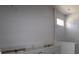 Bathroom featuring double vanity with granite countertops and a tiled shower at 10636 Crescent Creek Xing, Parrish, FL 34219