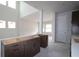 Unfinished kitchen with brown cabinets and white countertops at 10644 Crescent Creek Xing, Parrish, FL 34219
