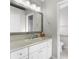 Bathroom featuring a white vanity and bright lights at 13526 Norman Cir, Hudson, FL 34669