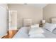 Bedroom with hardwood floors and a view to the hall at 13526 Norman Cir, Hudson, FL 34669