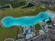 Experience the community's incredible lagoon with beach access, water activities, and clubhouse amenities at 17152 Scuba Crest St, Wimauma, FL 33598