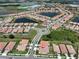 Aerial view of the home highlighting its location within a vibrant community near lakes at 17152 Scuba Crest St, Wimauma, FL 33598