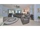 Open layout with views of living room, stainless steel appliances, kitchen, recessed lighting at 17152 Scuba Crest St, Wimauma, FL 33598