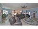 Open floor plan showing the living room and kitchen, with bar seating at 17152 Scuba Crest St, Wimauma, FL 33598