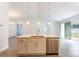 Bright kitchen with a central island and stainless steel appliances at 17406 Isaac Ln, Punta Gorda, FL 33955