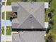 Aerial view featuring roof and landscaping, with sidewalks and driveways, offering a glimpse of the community's layout at 31820 Blythewood Way, Wesley Chapel, FL 33543