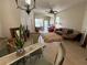 Inviting living room with tile flooring, neutral tones, and ample natural light at 31820 Blythewood Way, Wesley Chapel, FL 33543