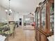 Open concept living room and dining room with tile flooring throughout at 31820 Blythewood Way, Wesley Chapel, FL 33543