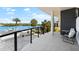 Spacious outdoor balcony boasting picturesque views and seating area at 32 Gulf Blvd, Indian Rocks Beach, FL 33785