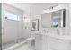 Sleek bathroom featuring glass shower, modern fixtures, and stylish tile work for a spa-like experience at 32 Gulf Blvd, Indian Rocks Beach, FL 33785