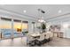 Elegant dining room with beach views, bright interior, and stylish modern decor at 32 Gulf Blvd, Indian Rocks Beach, FL 33785