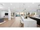 Open concept living with island seating, ocean views, and stylish decor at 32 Gulf Blvd, Indian Rocks Beach, FL 33785