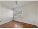 Bedroom features hardwood floors, crown molding, and window providing natural light at 3220 10Th N St, St Petersburg, FL 33704