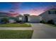 Beautiful single-Gathering home with manicured lawn and landscaping at 33298 Major Oak Dr, Wesley Chapel, FL 33545