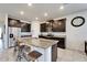 Kitchen island with granite countertops, stainless steel appliances, and ample counter space at 33298 Major Oak Dr, Wesley Chapel, FL 33545
