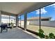 Large screened lanai overlooking the backyard of this home at 33298 Major Oak Dr, Wesley Chapel, FL 33545