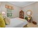 Inviting bedroom featuring neutral tones, a large window, and tastefully selected furniture at 3543 Watermark Dr, Wesley Chapel, FL 33544