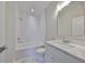 Bright bathroom with a white vanity and modern fixtures at 3915 W Euclid Ave, Tampa, FL 33629