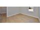 Clean bedroom with light walls and floors, and a bright sunny window at 3915 W Euclid Ave, Tampa, FL 33629