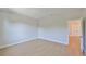 A bright bedroom with light hardwood floors and neutral paint at 3915 W Euclid Ave, Tampa, FL 33629